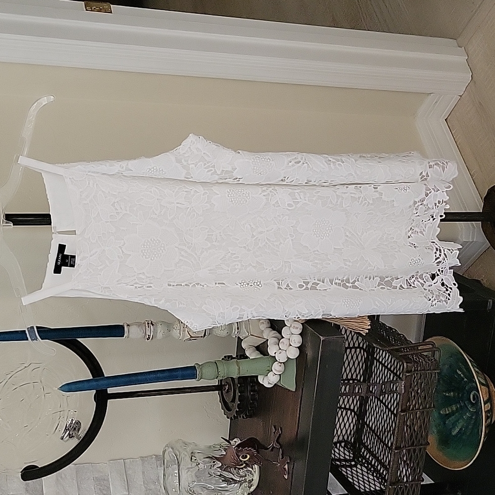 Alfani halter top, white floral crochet.   Lined with raw crochet hem size 12